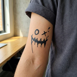 Creepy Joker Smile Tattoo - 1 | Temporalis