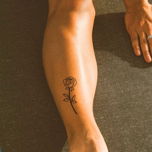 Fine line rose temporary tattoo with stem and leaves - 1 | Temporalis