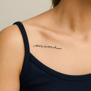 “mine” cursive script temporary tattoo - 1 | Temporalis