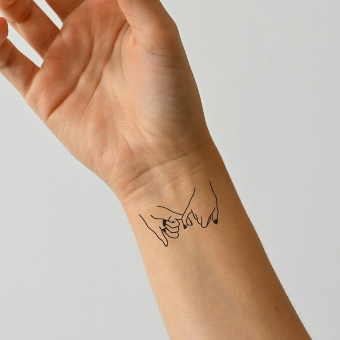 Pinky Promise fine - line temporary tattoo with black nails - 1 | Temporalis