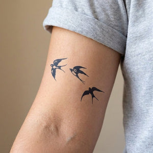 Three Swallow Silhouettes Tattoo - 1 | Temporalis