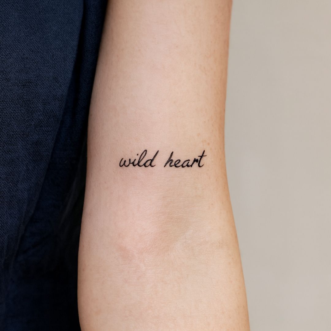 Wild heart temporary tattoo in cursive script - 1 | Temporalis