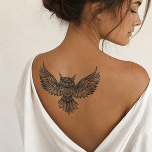 Mandala owl in flight temporary tattoo with spread wings and intricate geometric feather detail, fine linework on white background.