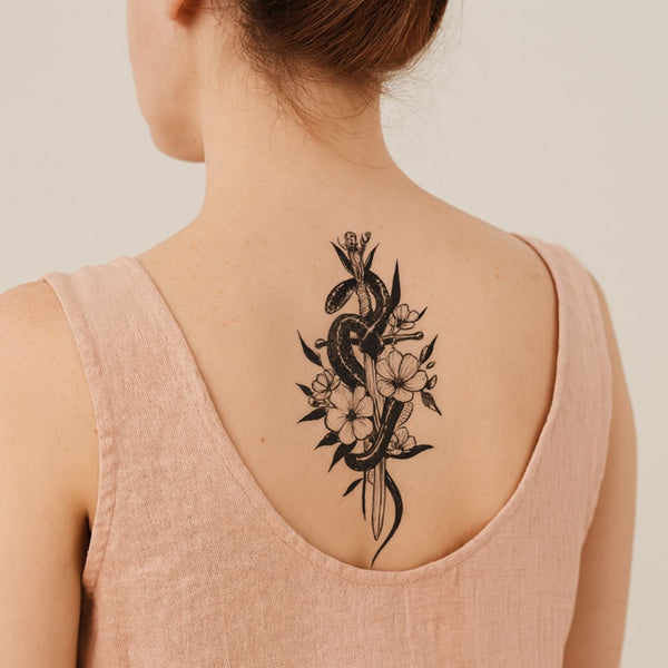 Snake wrapped around a sword with flowers, temporary tattoo in jagua ink